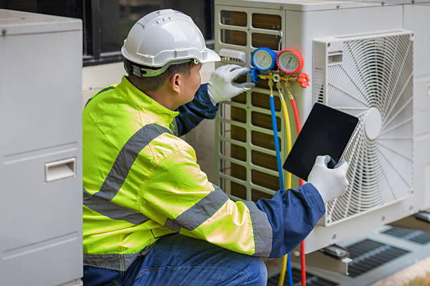 Professional Air Conditioning Repair technician working in West Bridgewater, MA